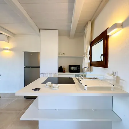 223 Seafront Apartment With Beach Access In Baja Sardinia - By Coral Property *